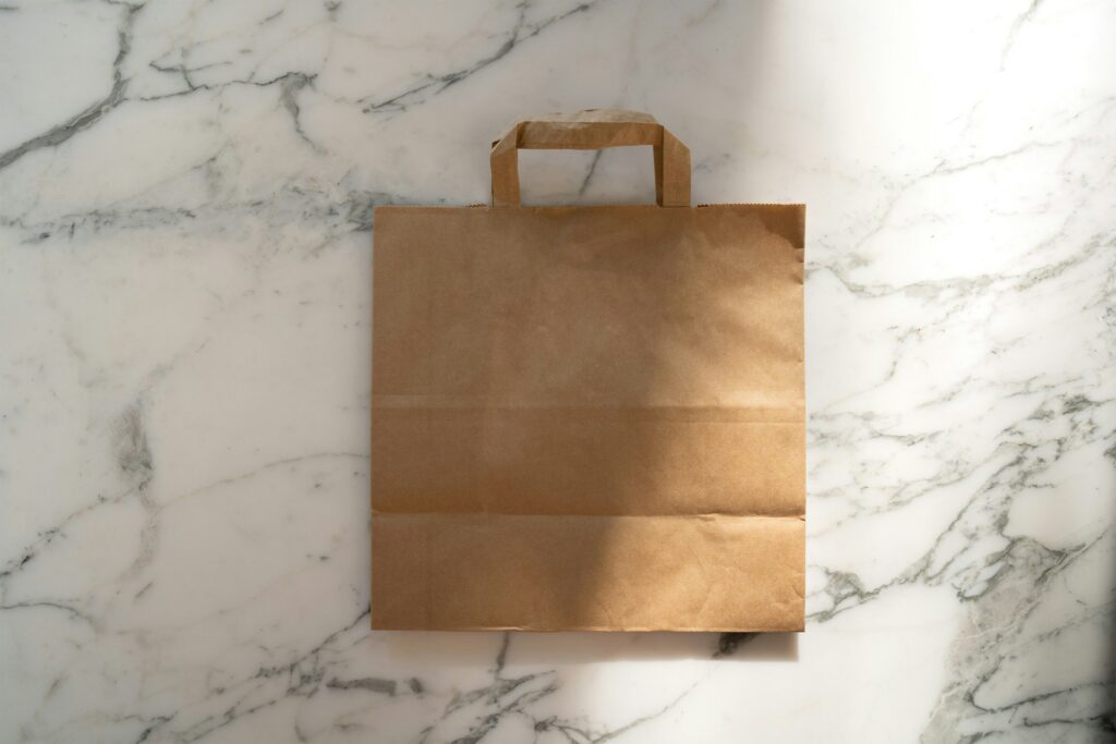 Brown kraft paper bag with flat handles